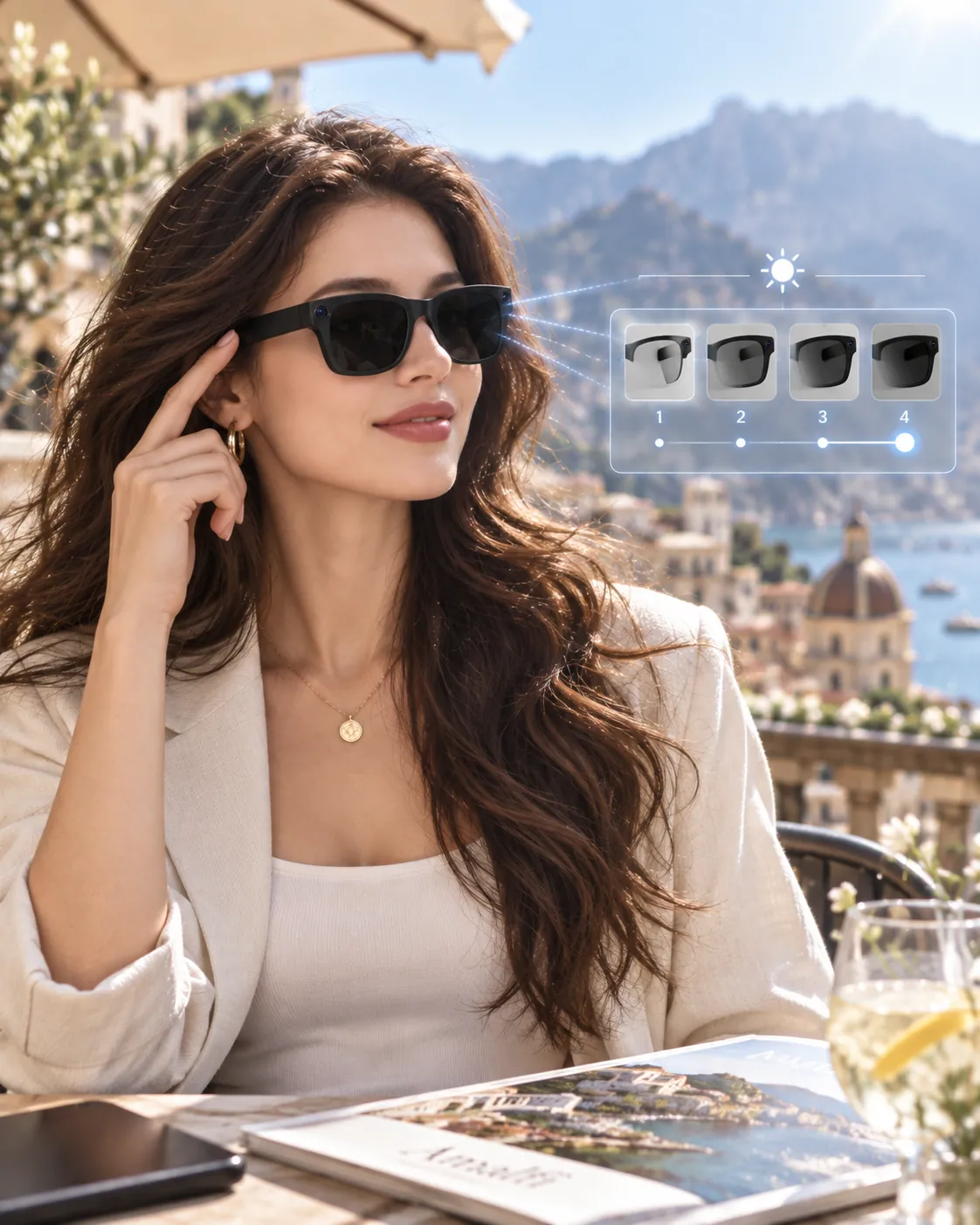 Woman wearing TY adaptive tint AI glasses on a bright terrace